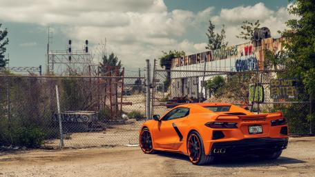 Vibrant Chevrolet Corvette in an Urban Setting wallpaper