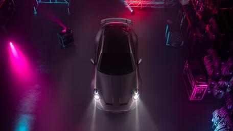 Futuristic Car Under Neon Lights wallpaper