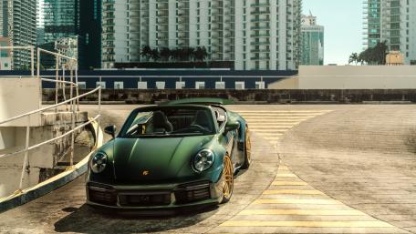 Sleek Porsche 992 in Urban Setting wallpaper