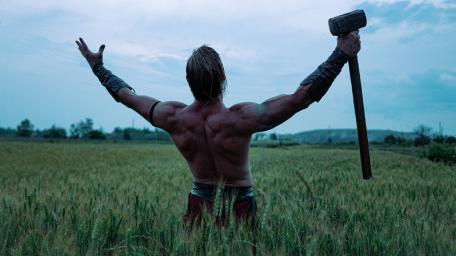 Triumphant Warrior Embracing the Open Fields wallpaper