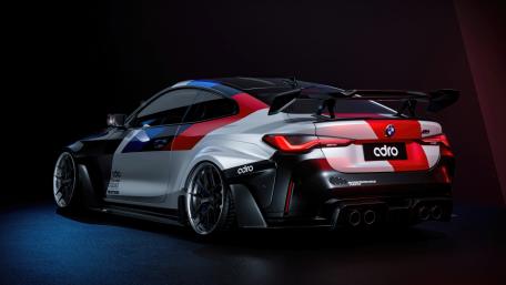 Sleek BMW M4 Race Car in Dynamic Pose wallpaper