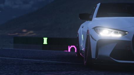 Sleek Car in a Neon Nightscape wallpaper