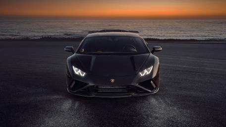 Sunset Drive with a Lamborghini Huracan Luxury Sports Car wallpaper