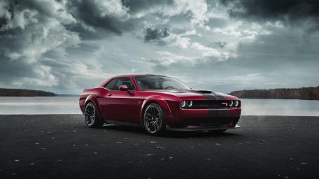 Red Dodge Challenger SRT Hellcat Against Dramatic Skies wallpaper