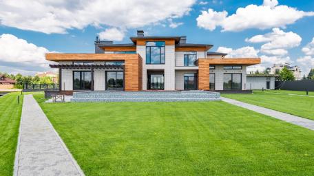 Modern Architectural Elegance in a Serene Setting wallpaper