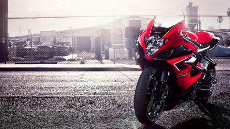 Sleek Red Suzuki Sport Bike Wallpaper wallpaper