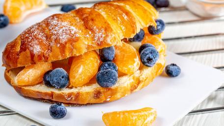 Delicious Croissant Sandwich with Fresh Fruits wallpaper