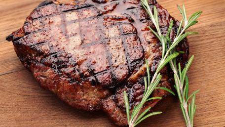 Savory Grilled Steak with Fresh Rosemary wallpaper