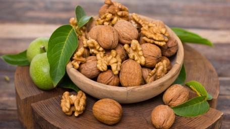 Nuts Galore Fresh Walnuts in a Bowl wallpaper
