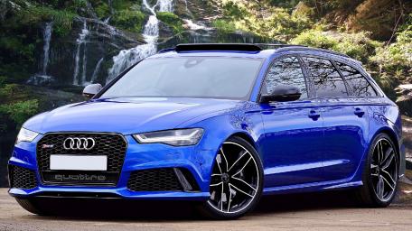 Sleek Audi RS6 in a Natural Landscape wallpaper