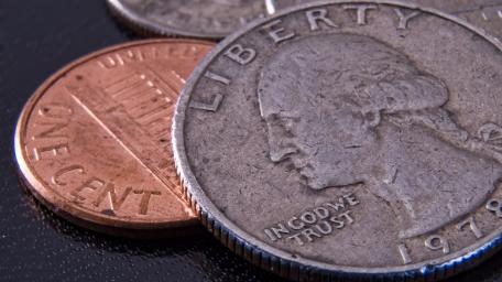 Penny and Coin Close-Up Wallpaper wallpaper