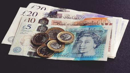 Wealth in Currency Displayed Carefully wallpaper