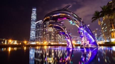Illuminated Urban Waterfront at Night wallpaper