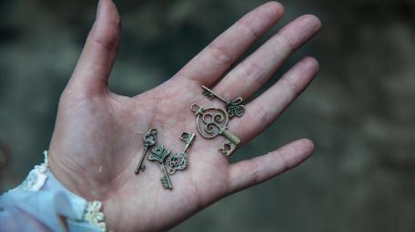 Symbolic Keys in Hand for New Beginnings wallpaper