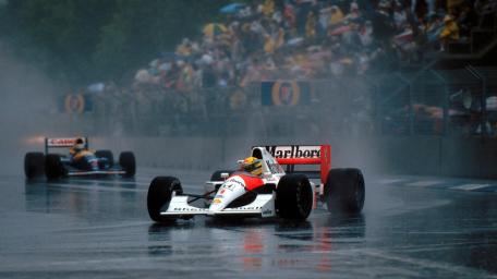 Racing Glory in the Rainy Circuit wallpaper