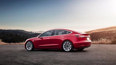 Tesla Model 3 in Stunning Landscape View wallpaper