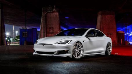 Sleek Elegance Tesla Model S at Night wallpaper