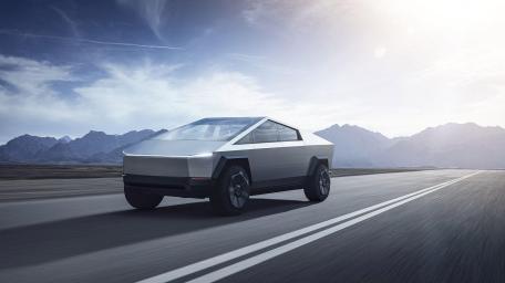 Futuristic Truck Cruising on Highway wallpaper