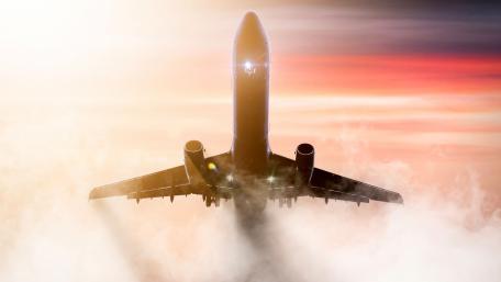 Soaring Above the Clouds at Sunset wallpaper