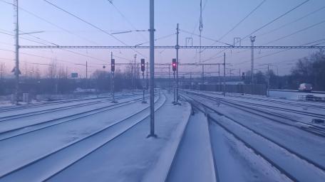 Frozen Tracks Under a Colorful Sky In The Early Morning Light wallpaper