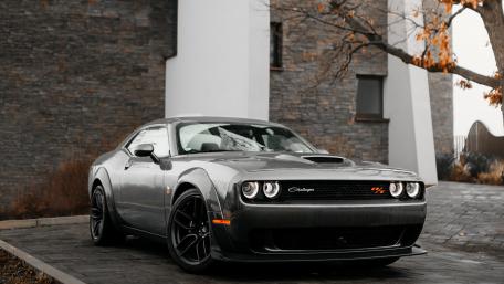 Sleek Dodge Charger in Bold Surroundings wallpaper