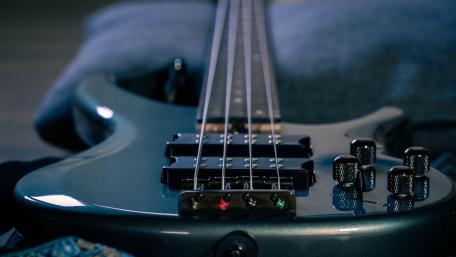 Electric Guitar Close-up with Moody Vibe wallpaper