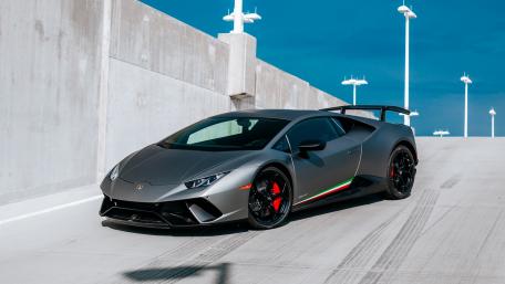 Sleek Black Lamborghini Huracan Performante Dominates the Concrete wallpaper