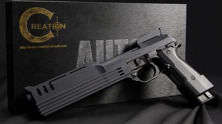 Sleek Firearm on Textured Background wallpaper