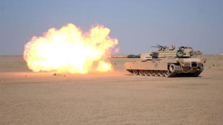 Fiery Tank Blast in Desert Terrain wallpaper