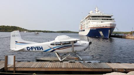 Seaside Escape with Plane and Cruise Ship wallpaper