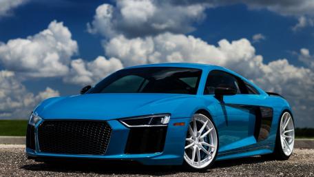 Sleek Blue Sports Car Exuding Elegance wallpaper