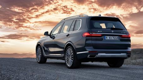 Luxury BMW X7 SUV at Sunset Drive wallpaper