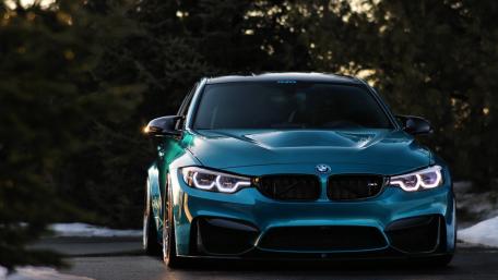 Stunning BMW M4 in Striking Turquoise Hue wallpaper