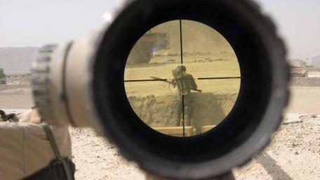 Focused Perspective of a Soldier in Action wallpaper