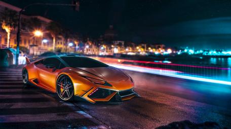Luxurious Sports Car Under Starlit Sky wallpaper