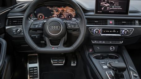 Sleek Interior of Audi RS 4 Avant 4K Wallpaper wallpaper