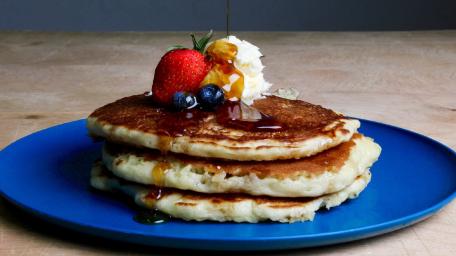 Delicious Pancake Stack with Fresh Berries wallpaper