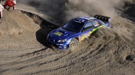Subaru Impreza WRX STI Rally Car Power Slide on Gravel Track wallpaper