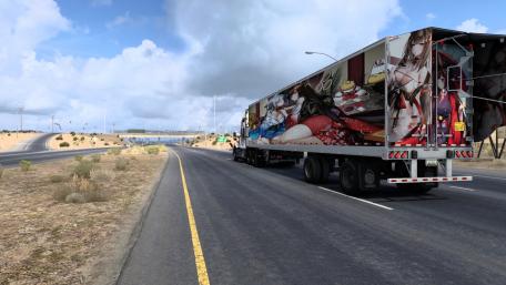 Vibrant Truck on an Open Road Scene wallpaper