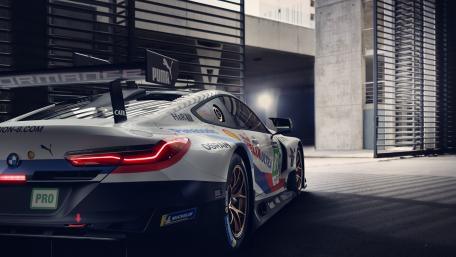 Sleek Racing Machine Ready for Action wallpaper