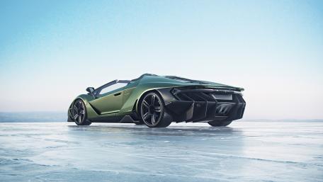 Sleek Green Supercar on Ice wallpaper