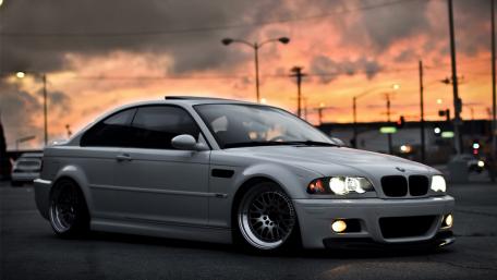 Sleek BMW E46 Under a Stunning Sunset Sky wallpaper