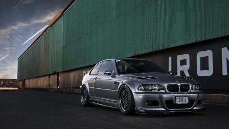 Sleek Silver BMW M3 in Urban Setting wallpaper