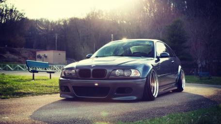 Sleek BMW M3 on a Scenic Pathway wallpaper