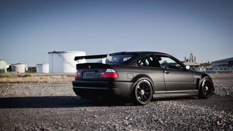 Sleek BMW E46 M3 in a Modern Setting wallpaper