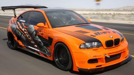 Blazing Speed on Asphalt Road wallpaper
