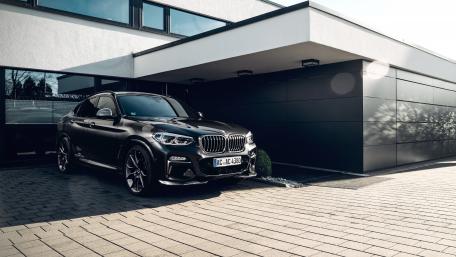 Luxury Vehicle at Modern Home wallpaper