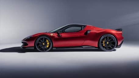 Sleek Red Ferrari 296 GTB Sports Car Elegance wallpaper