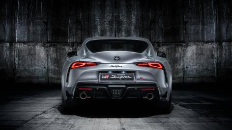 Toyota Supra GR Poised in Industrial Ambiance wallpaper