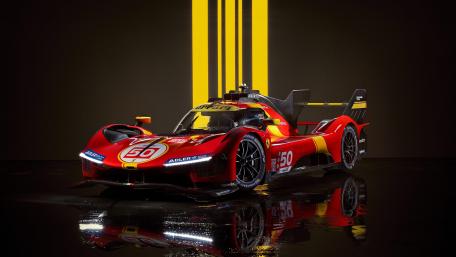 Sleek Racing Machine on Display wallpaper